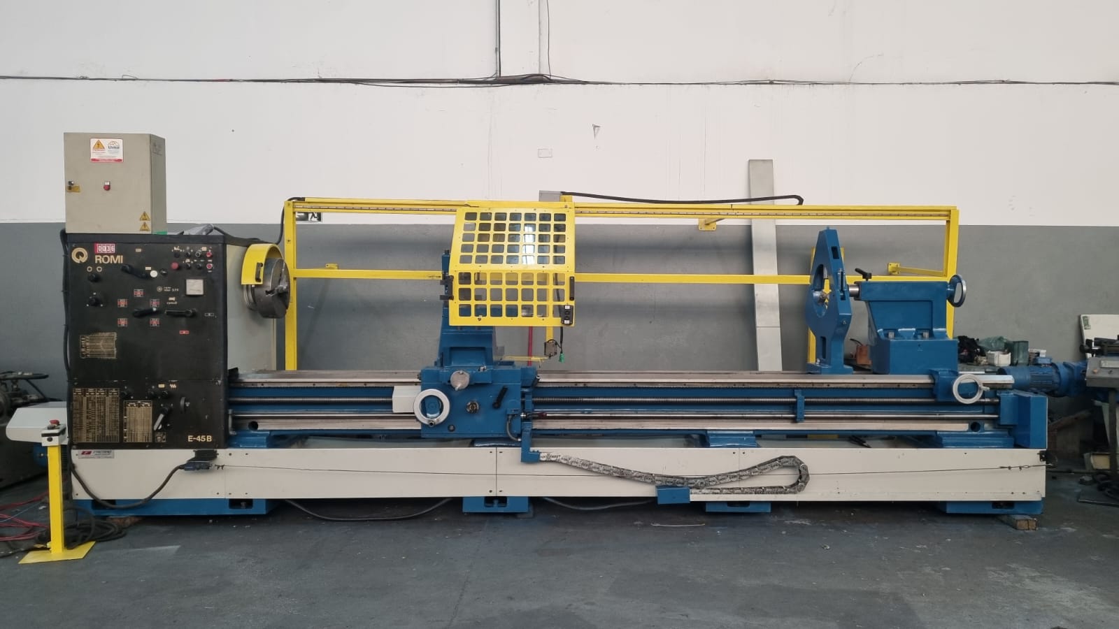 TORNO MECÂNICO ROMI E-45B 1100 X 4000 MM USADO NO ESTADO